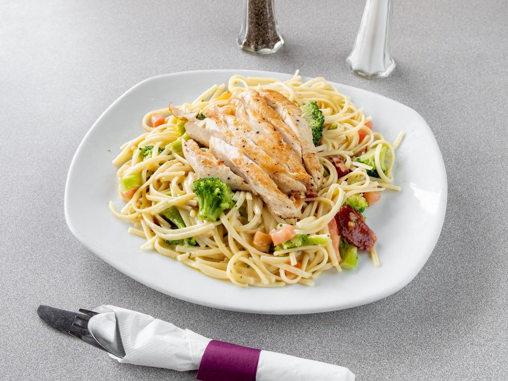 Chicken, Bacon, & Broccoli Pasta · Lemon herb chicken, bacon, broccoli, tomatoes, and Parmesan cheese on linguine with a lemon garlic cream sauce