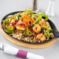 Hibachi Grilled Shrimp Skillet · Teriyaki glazed grilled shrimp, stir-fried with red bell peppers, red onions and broccoli, a...