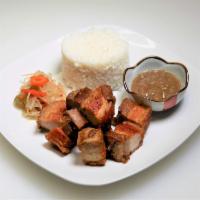 Lechon Kawali Plate · Roasted pork belly with rice and dipping sauce.