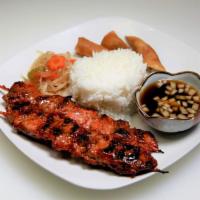 BBQ Pork Plate · Pork BBQ with spring rolls and rice.