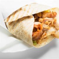 Halal Lamb and Chicken Gyro in Pita · Halal lamb and chicken with vegetables stuffed in a fresh hot pita.