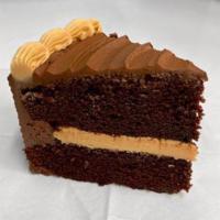 SOLD OUT. . . Chocolate Peanut Butter Cake, by the slice! · Chocolate Devil's Food cake, with creamy peanut butter filling, and frosted with chocolate b...
