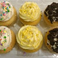 12-Cupcake Party Pack!  · A mix of 12 cupcakes from our current menu. Check the add-ons section below if you need cand...