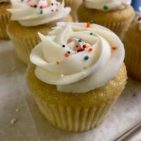 Vanilla Cupcake · Vanilla cupcake with vanilla buttercream and sprinkles.