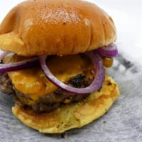 Classic Cheeseburger · Xenos burger, American, pickles, lettuce, tomatoes, onions, mayo and ketchup.