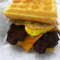 Chicken and Waffle Sandwich · 2 belgian waffles, syrup, 2 crispy chicken, egg, double bacon, cheddar cheese, grilled onion...