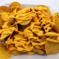Basic Nachos · Round nachos and nacho cheese.