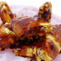 #3. Honey BBQ Fusion Wings · BBQ sauce,  honey, garlic spices and garlic chili. Lightly spicy.