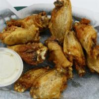 #4. Garlic truffle Wings · Garlic truffle and ranch seasoning. Served with side of ranch sauce. 