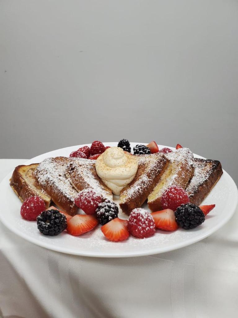 French Toast Special · French Toast with raspberry, blackberry, strawberry, topped with powdered sugar 