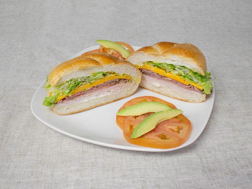 New Yorker Baguette · Turkey, roast beef, cheddar cheese, lettuce, mayonnaise and mustard.