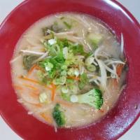 N4. Veggie Ramen Noodle · Bean sprout, onions, carrot and slow cooked broth with broccoli.