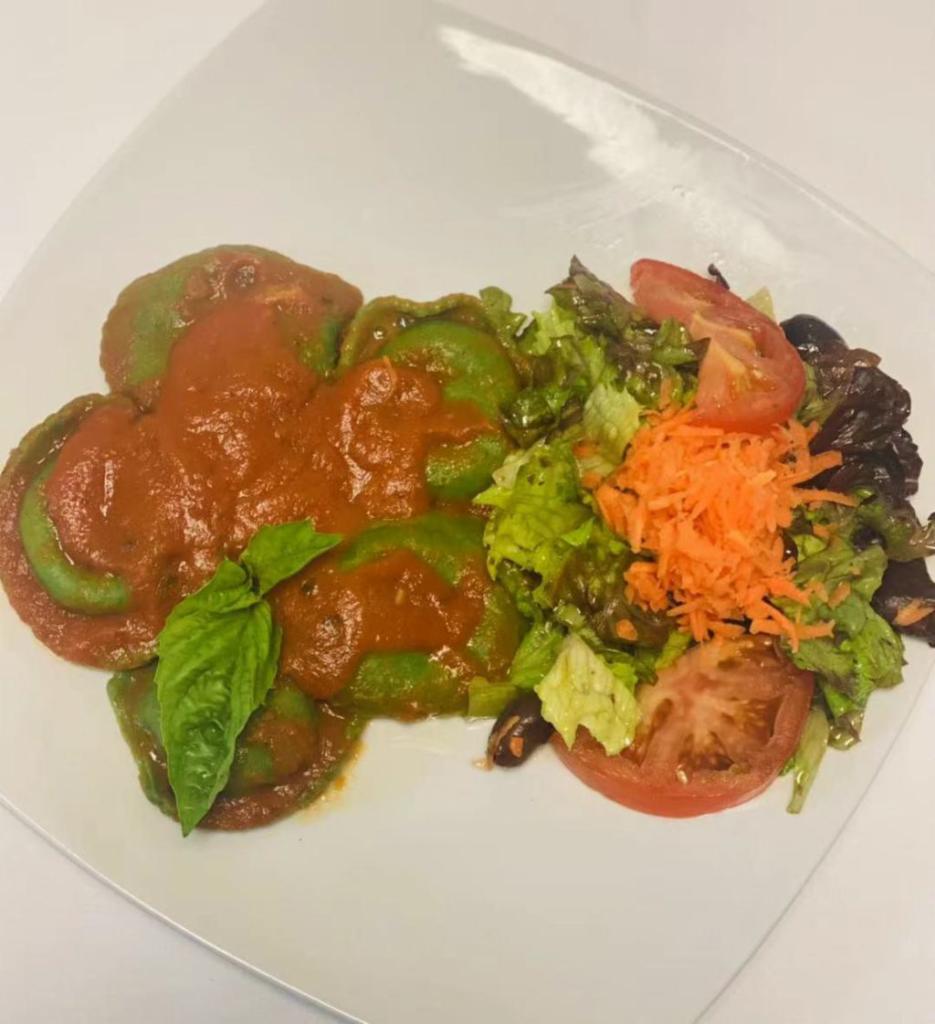 Spinach Ravioli, Insalata Mista · Homemade spinach ravioli with pesto, pomodoro or pistachio sauce, mixed greens, tomatoes, carrots, olives, fine herbs, red winevinegar, extra-virgin olive oil.