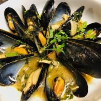 Steamed mussels · fresh mussels with garlic in white wine sauce