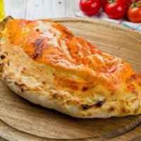 Calzone · Ricotta and mozzarella. Served with a side of marinara sauce.