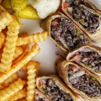 Beef African Hausa Sandwich · Served with American french fries.