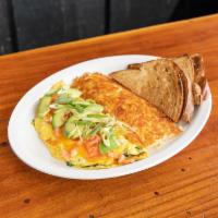 Blue Spring Omelette · Blue cheese crumbles, cheddar cheese, spinach and mushrooms with  tomato and green onions. S...