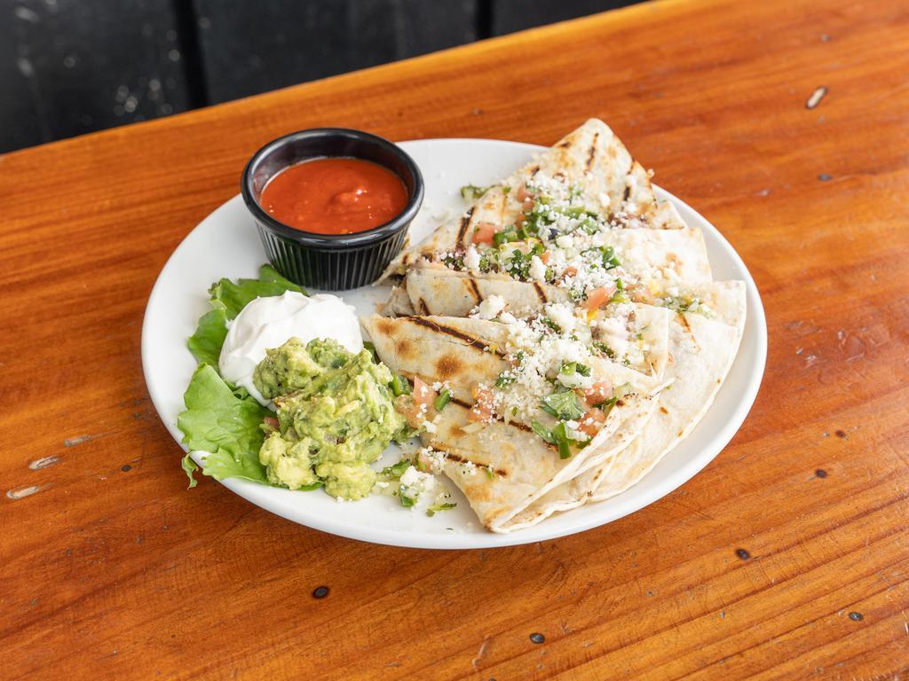 Grilled Quesadilla · Steak, chicken or ground beef with black beans, corn, Monterey Jack cheese. Topped with pico de gallo, queso fresco, sour cream and salsa on the side.
