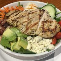 Spinach Cobb Salad · smoked chicken, bacon, carrots, cucumbers, avocado, hard boiled egg, grape tomatoes and blue...