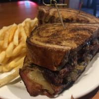 Bacon Swiss Patty Melt · Hamburger patty served on grilled rye bread with Thousand Island, grilled onions, Swiss chee...