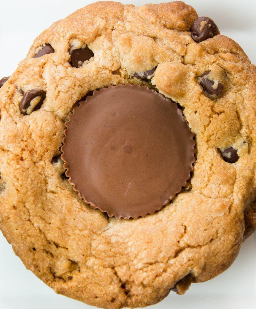 The Colossal Peanut Butter Cup · Technically everything is better with a Peanut Butter Cup, so why not throw it in ;) Cookies are approximately 4 inches in diameter and 3/4 inch thick