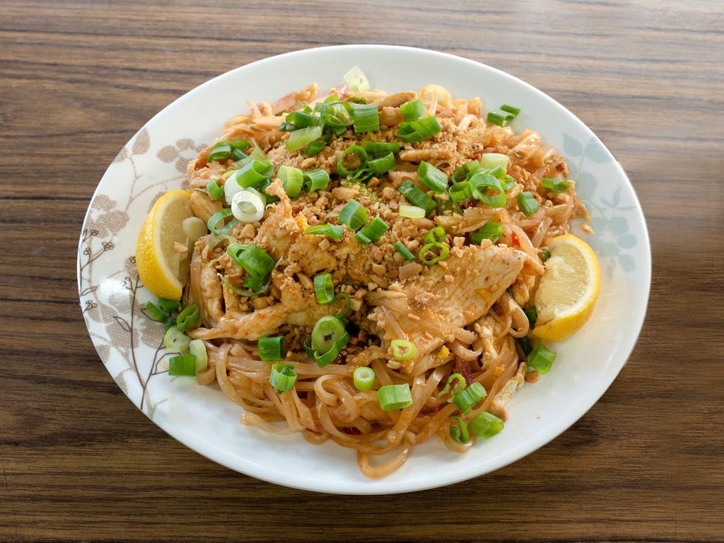 T2. Chicken Pad Thai · Stir-fried Thai noodles with chicken, bean sprouts, scallions, egg and topped with ground peanuts and lime. Hot and spicy.