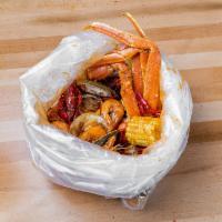 Pick 4 Cajun Boil · Choice of seafood, sauce, and 3 sides. Corn & potato included.