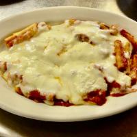 Baked Ziti · Fresh cooked ziti with tomato sauce and ricotta cheese. Topped with melted mozzarella. Serve...