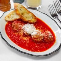 Meatballs · Beef meatballs, tomato sauce, and Parmigiano Reggiano.