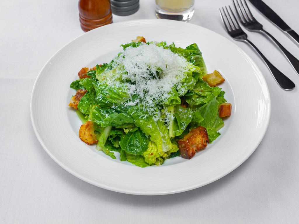Caesar Salad · Romaine lettuce homemade Caesar dressing, Parmigiano Reggiano, and crouton.