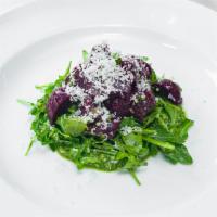 Roasted Beets Salad · Arugula pesto, Parmigiano Reggiano, and baby arugula.