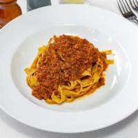 Fettuccine Ragu · Homemade pasta beef and pork ago.