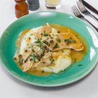 Veal Picatta · Veal scaloppini, lemon caper sauce, and roasted garlic mashed potatoes.