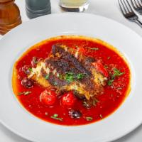 Cod Livornese · Pan seared cod, served on tomato, olives and caper sauce.