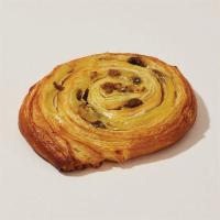 Pain Au Raisin · Buttery, flaky croissant dough with a custard filling and a sprinkle of sultanas baked to pe...