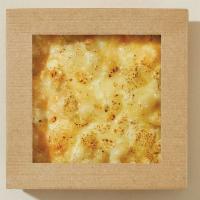 Classic Mac and Cheese · Cavatappi pasta carefully mixed with bechamel sauce and veggie parmesan freshly baked to che...