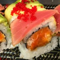 Spicy Twister Roll · Crunchy spicy salmon, crushed peanut rolled with Japanese chili pepper and Cajun tuna with a...