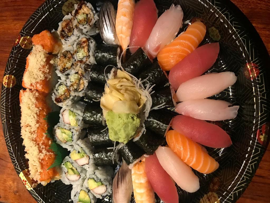 A. Sushi & Roll Platter · 14 pieces sushi and 5 rolls. Includes 4 pieces tuna, 2 pieces salmon, 2 pieces yellowtail, 2 pieces white fish, 2 pieces shrimp, 2 pieces mackerel, 1 tuna roll, 1 salmon roll, 1 California roll, 1 eel cucumber roll and 1 crazy roll.