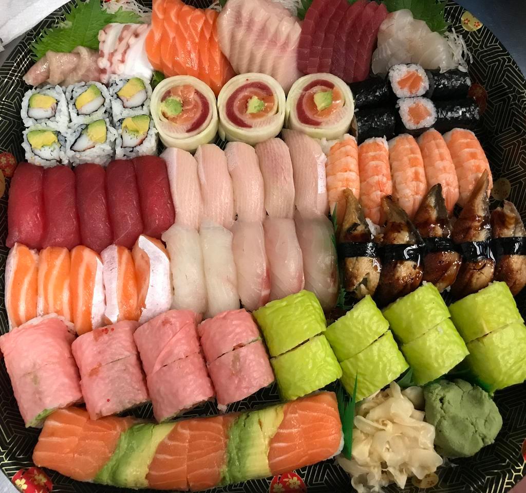I. Sushi Sashimi & Roll Platter · Sushi: 5 tuna, 5 salmon toro, 5 yellow toro, 5 eel, 5 white fish, 5 shrimp. Sashimi: 3 Salmon Toro , 3 Yellowtail Toro, 6 tuna, 6 salmon, 6 yellowtail, 6 white tuna, and 3 Fluke. Roll: 1 pink lady, 1 spicy girl, 1 Perfect Match, 1 California, 1 salmon and 1 rainbow naruto.