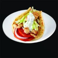 2. Chicken Shawarma Gyro · chicken shawarma , hummus , onion , pita bread ,lettuce , tomato, sauce