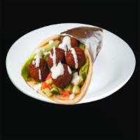 3. Falafel Gyro · Falafel , lettuce, tomato, hummus   on pita  bread