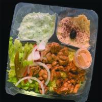 18- Shawarma Plate over rice · shawarma, rice ,tzatziki, dolma,hummus, olive lettuce, tomato, onion, with garlic sauce  on ...