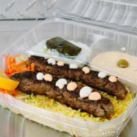 Shish beef kabab plate over rice · 