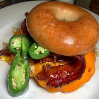 Classic Twist Sandwich · Maple bacon, egg, cheddar and roasted jalapeno on a toasted bagel.