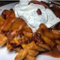Loaded Fries · Cheddar, bacon, sour cream and gravy.