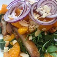Mandarin Chicken Salad · Breaded chicken cutlet, avocado, mandarin oranges, red onion, toasted almonds, arugula and k...