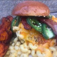 Steve Mac Queen Burger · Burger with mac n cheese, bacon, cheddar and roasted jalapenos on a brioche bun with sweet c...