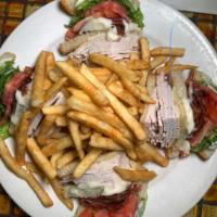 Turkey Triple Decker · Bacon, lettuce and tomato.