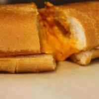 Deluxe Grilled Cheese Sandwich · American cheese, provolone, mozzarella and Texas toast.