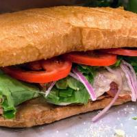 Italian Sub · Cold Sub with ham, salami, and capicola topped with lettuce, tomato, red onion, and Italian ...